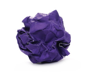 Crumpled purple paper ball isolated on white background