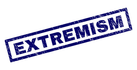 Rectangle EXTREMISM seal print with distress texture. Rubber seal imitation has rectangle frame. Blue vector rubber print of EXTREMISM text with scratched texture.