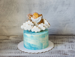 baptizing blue cream cake with gingerbread cookies