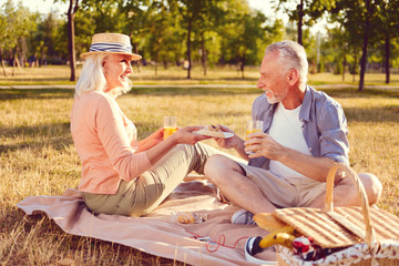 Together forever and always. Cheerful senior husband and wife looking at each other with eyes full...