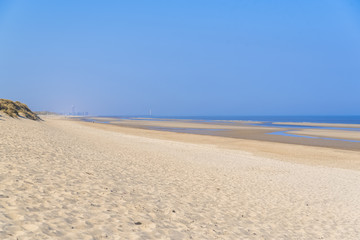 Ostende in Belgium, beautiful beach, panorama in summer, with Oostende in background
