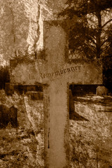 Cemetery Cross with In Remembrance Carving, Double Exposure blended with stone texture in sepia tone vertical photography