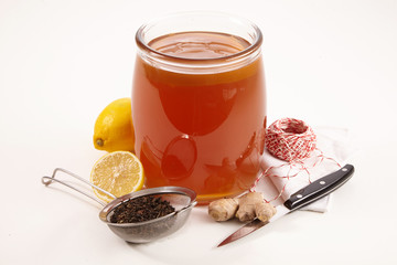 Glass jar of fermented sweetened Kombucha tea