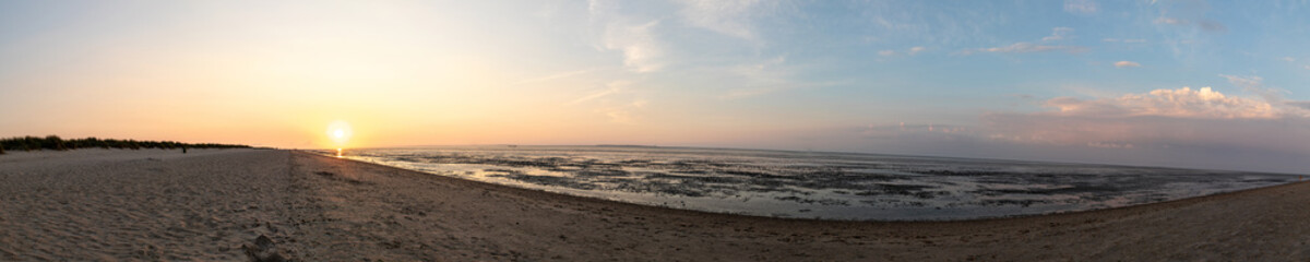 north sea sunset with beach panorama