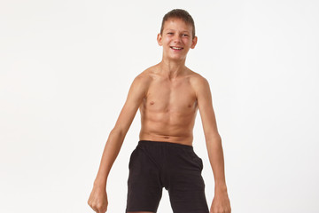 Fototapeta premium teenager with muscles. emotions of the winner.