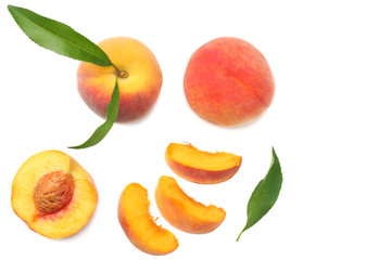 peach fruit with green leaf and slices isolated on white background. top view
