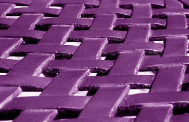 Part of metal construction pattern in purple tone.