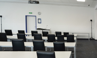 empty meeting room with chairs