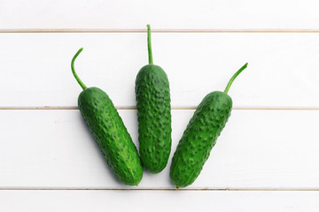 Cucumber on wooden background