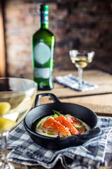 Marinated salmon with cream cucumber and dill.