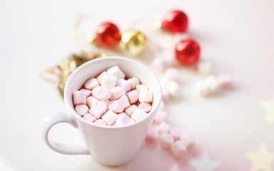 Marshmallow in white cup soft focus top view closeup background. Concept of Christmas Holiday