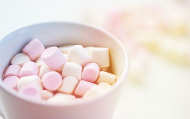 Christmas Holiday background with white and pink marshmallows