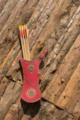 Old style wooden arrows in the case