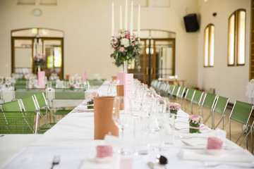 The wedding decor. The white flowers bouquet.
