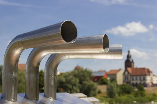 Exhaust pipes in sunshine and blue sky