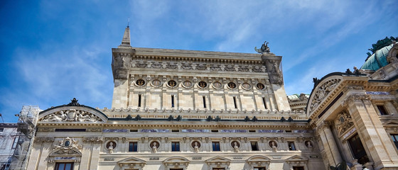 Fototapeta na wymiar Palais or Opera Garnier & The National Academy of Music (Grand Opéra). Detail of the west facade of the building. Paris, France, Europe