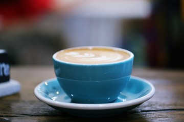 Latte coffee closeup blur background