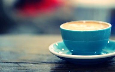 Latte coffee closeup blur background