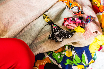 Wallpaper background of handcrafted colourful Abayomi dolls made with fabric.