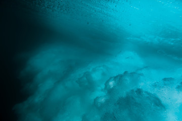 Wave texture in underwater. Clear water in ocean