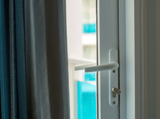 Morning light to bedroom from the back of glass door