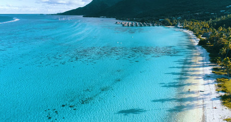 hotel with overwater bungalow in a lagoon in French Polynesia