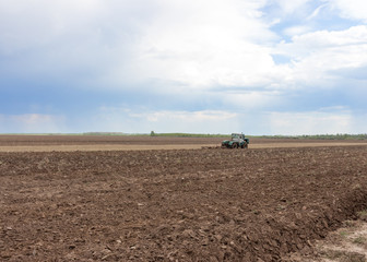 Obraz premium spring plowed field