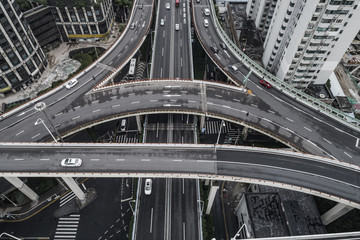 Aerial view of highway and overpass in city