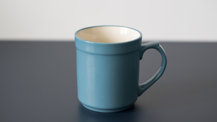 Blue Mug on grey table