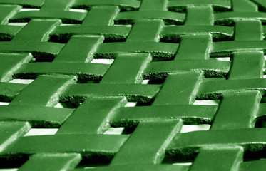 Part of metal construction pattern in green tone.