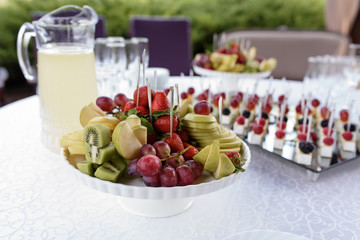 White fruit-pot with the range of bright fruit.