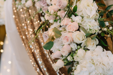 Fabric with golden sequins and gentle flowers