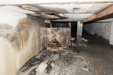 Mining trolley in a tunnel of an abandoned lime mine in Switzerland