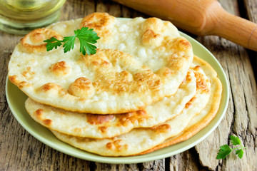 Fried flatbread flat bread piadina naan pita tortilla shelpek cheburek