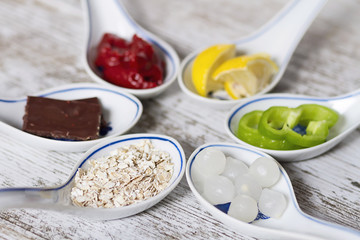 Porcelain spoons with ingredients