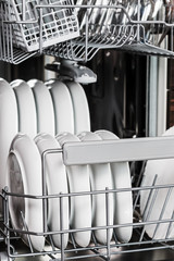 clean dishes and Cutlery in the dishwasher. work on cleaning the house