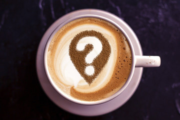 Coffee cup with question mark
