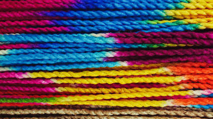 Closeup Shot of Beautiful Bright and Colorful Dyed Ropes for Background, Backdrop, or Wallpaper.