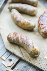 Grilled sausages in the backyard. Selective focus.