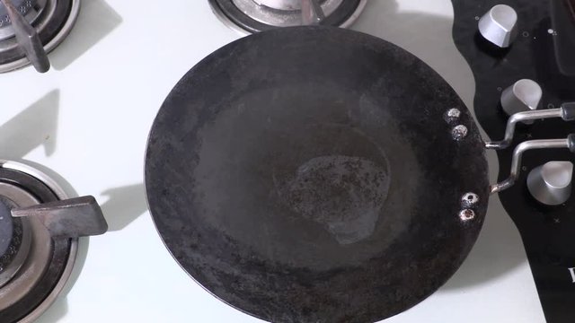 aak,aakdo,ark, Calotropis procera,madar plant with flower, aak leaf on tawa heating,heat aak leaf