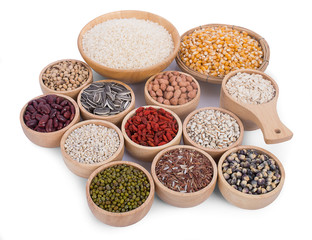 Cereal grains , seeds, beans on wooden background
