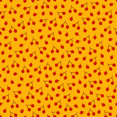 Autumn seamless pattern with red berries on yellow background