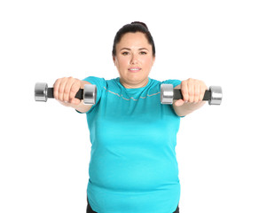 Fototapeta na wymiar Overweight woman doing exercise with dumbbells on white background