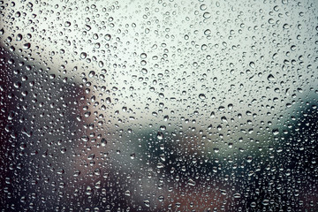 Naklejka na ściany i meble Raindrops on window