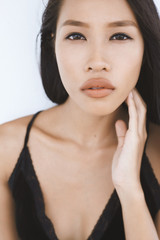 Naklejka premium Asain model against white