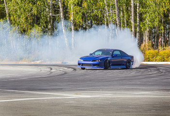 Obraz na płótnie Canvas car drifting on speed track