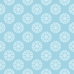 White floral seamless design on blue background