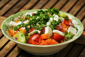 Mixed salad in a salad bowl