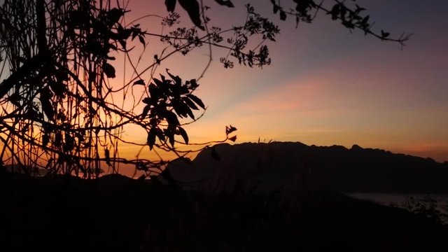 On top of Mount Tapyas before sunrise. beutiful pink clouds with foreground