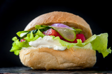 Sandwich with fresh vegetables and cream cheese